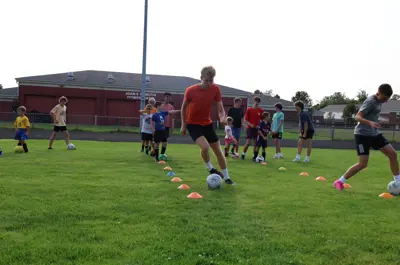 kid doing a soccer drill