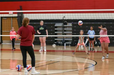 girls playing volleyball