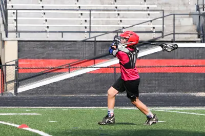 kid playing lacrosse