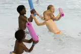campers playing in the pool