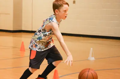 kid playing basketball