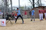 baseball player hitting the ball