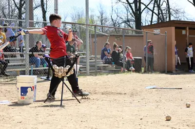 baseball player hitting the ball