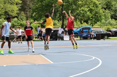 Youth basketball player shooting a shot