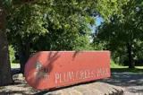 plum creek park sign