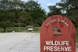 forest lakes wildlife preserve sign