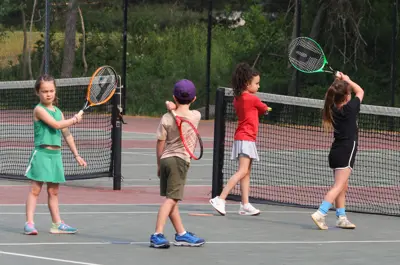 kids playing tennis