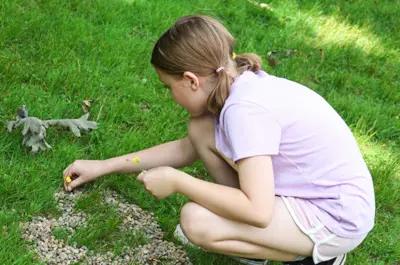 Camper playing in grass