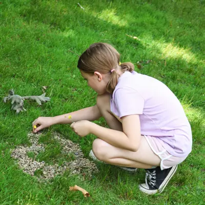 Camper playing in grass