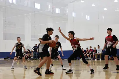 young children playing basketball